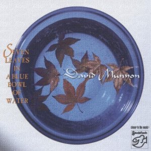 Seven leaves in a blue bowl of water